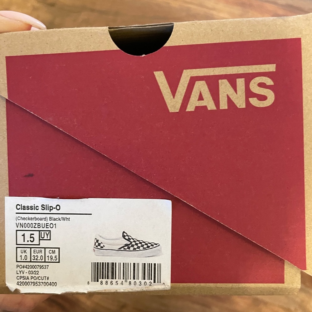 New never worn black & white checked Vans.